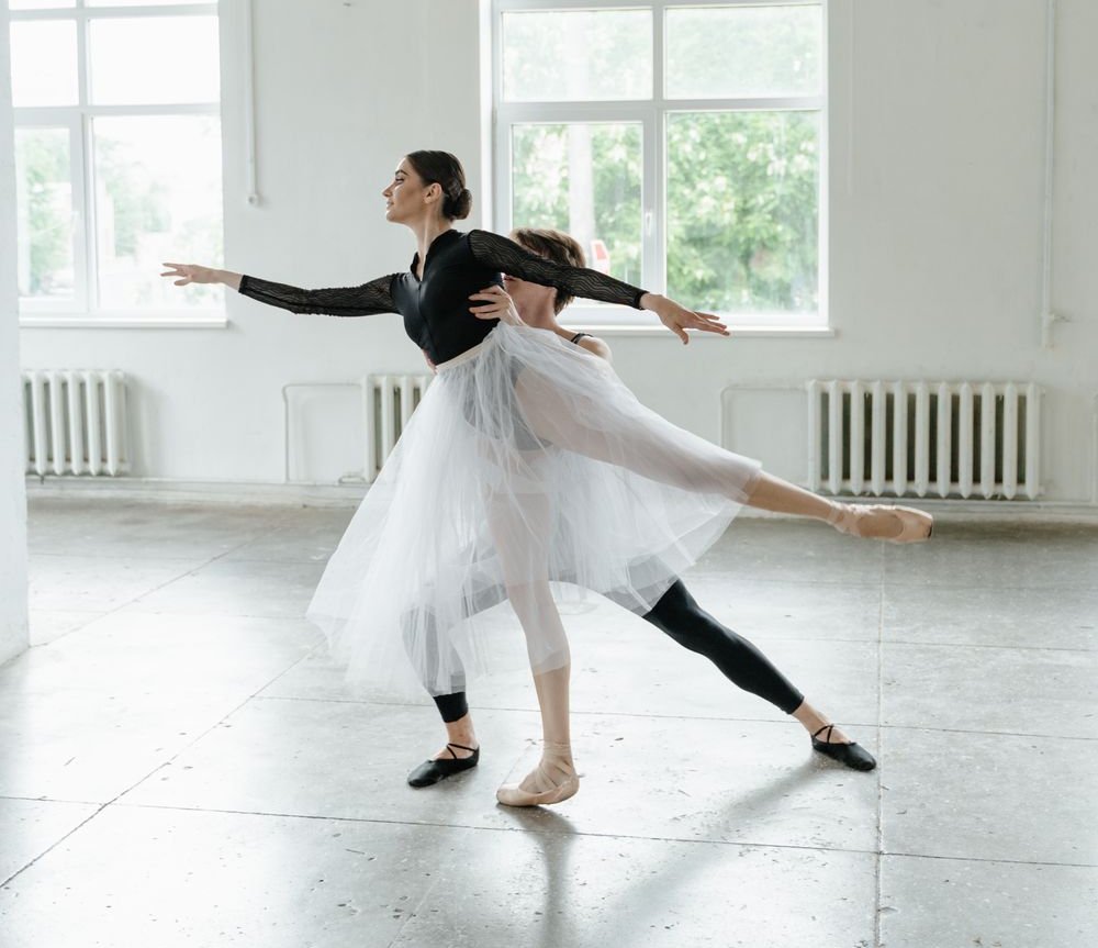 Dancers performing on a theatre stage