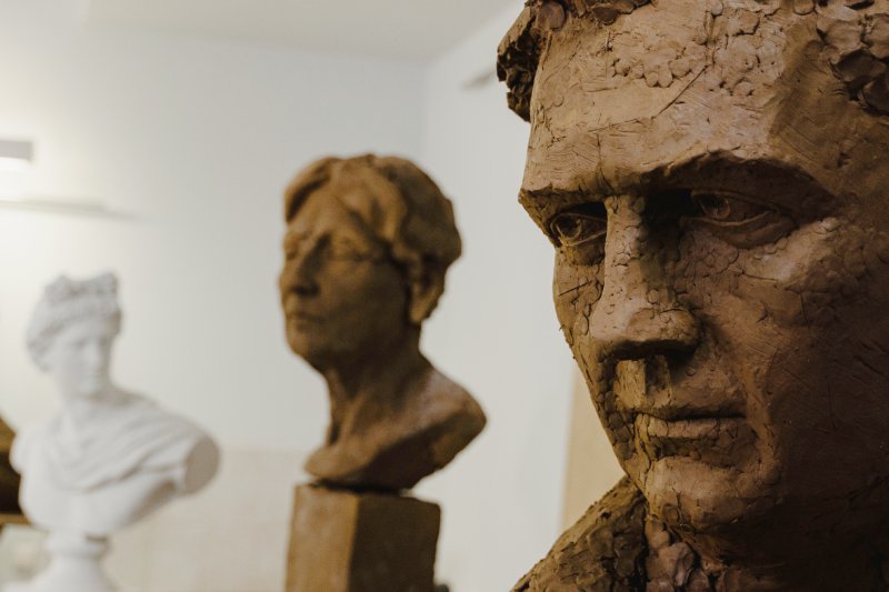 Artist creating a clay sculpture